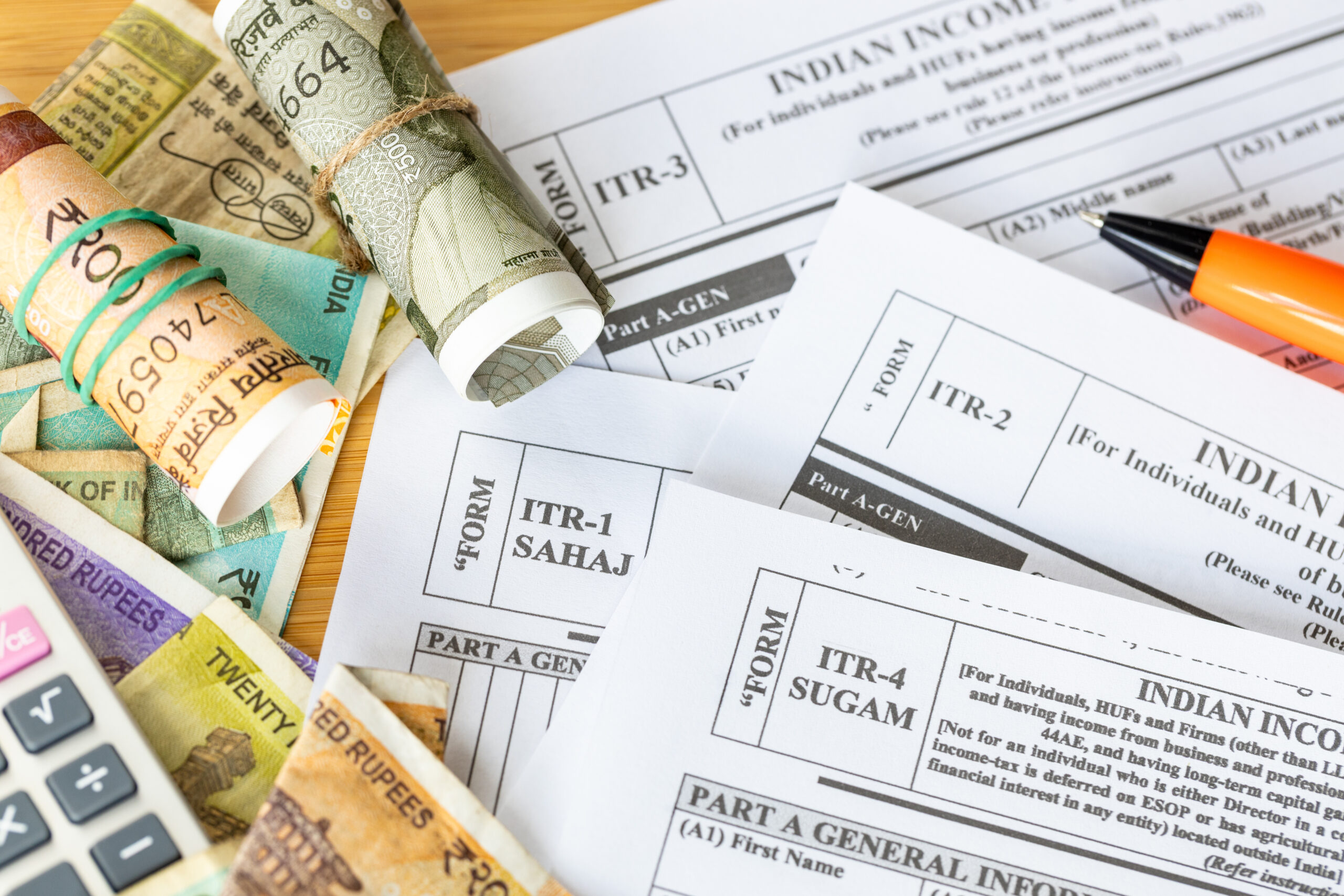 India taxes. Various ITR forms to fill out. Income tax return. Annual tax declaration. Financial concept. ITR written on wooden blocks. Close up